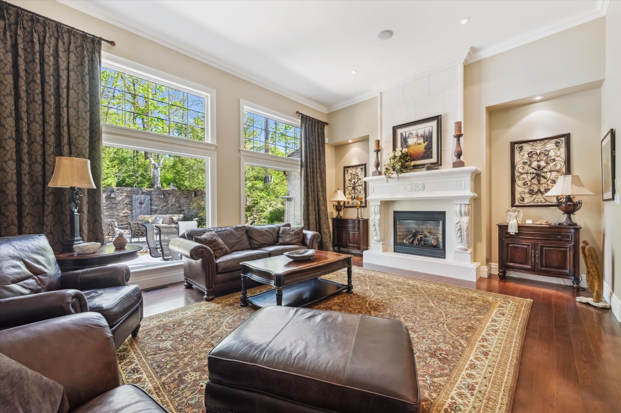 Grand living room with forest views