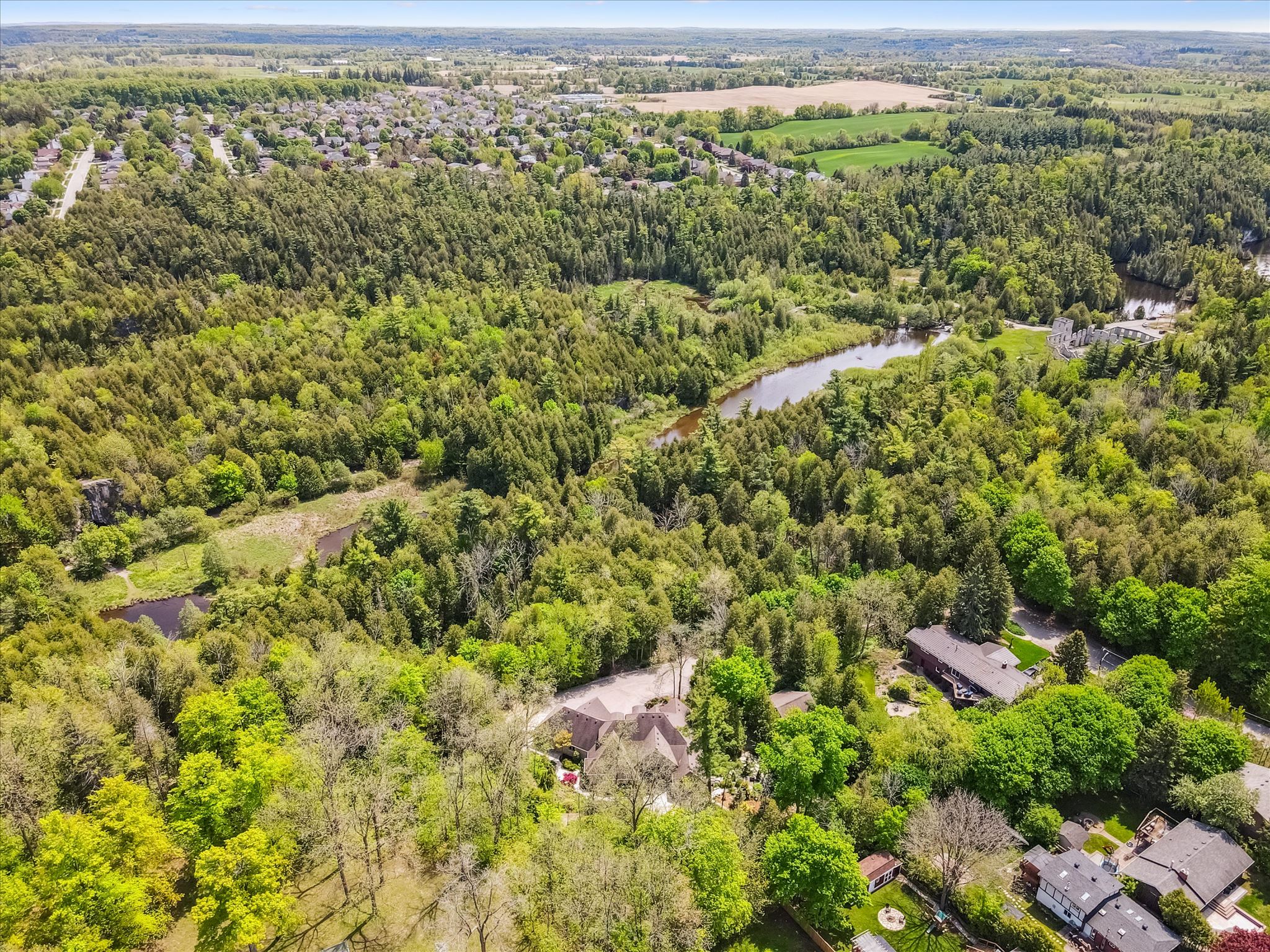 Aerial view showing property, Eramosa River, and conservation area